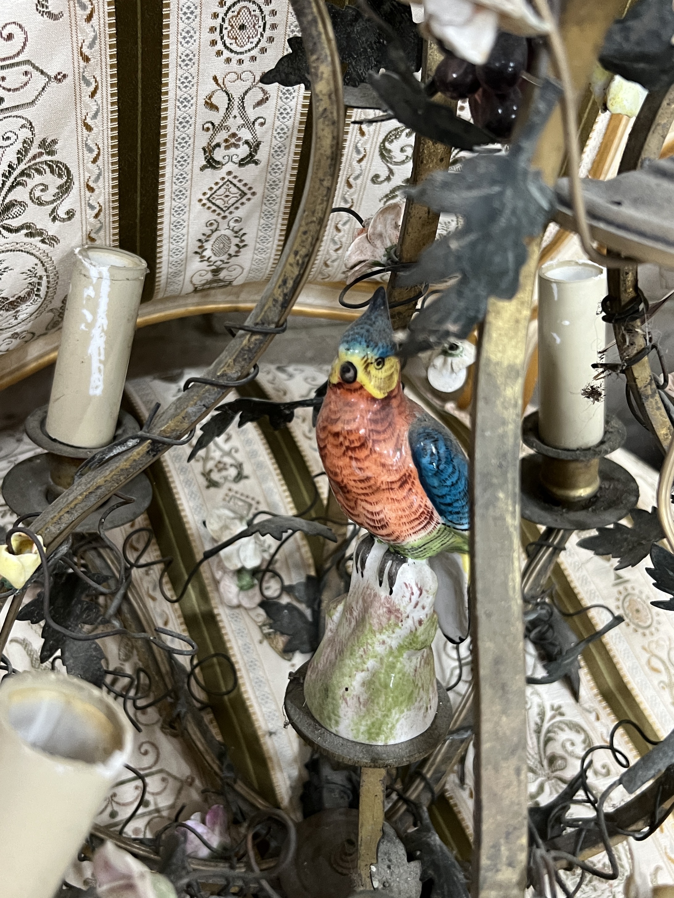A porcelain and gilt metal budgerigar ceiling light, height 46cm